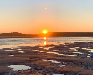 Low tide and sunset at a Maine shore