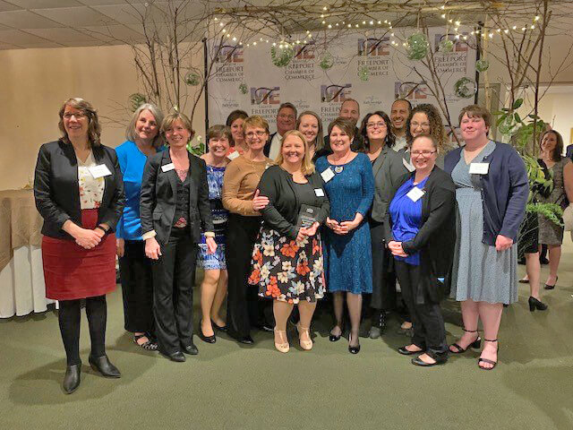 Michelle Barker (center) received the Ed Bonney Community Contribution Award.